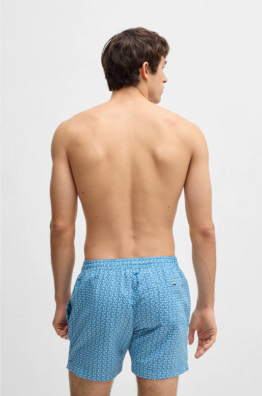 PRINTED SWIM SHORTS WITH LOGO BADGE