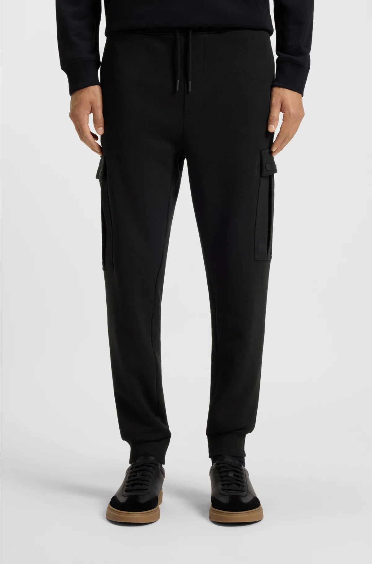 RELAXED-FIT COTTON-TERRY TRACKSUIT BOTTOMS WITH CARGO POCKETS