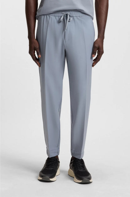 TAPERED-FIT TROUSERS IN WATER-REPELLENT STRETCH FABRIC