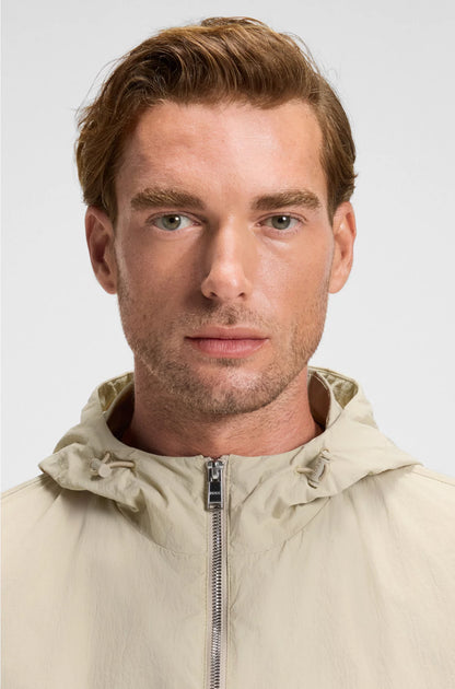 WATER-REPELLENT JACKET IN CRINKLE FABRIC WITH ADJUSTABLE HOOD