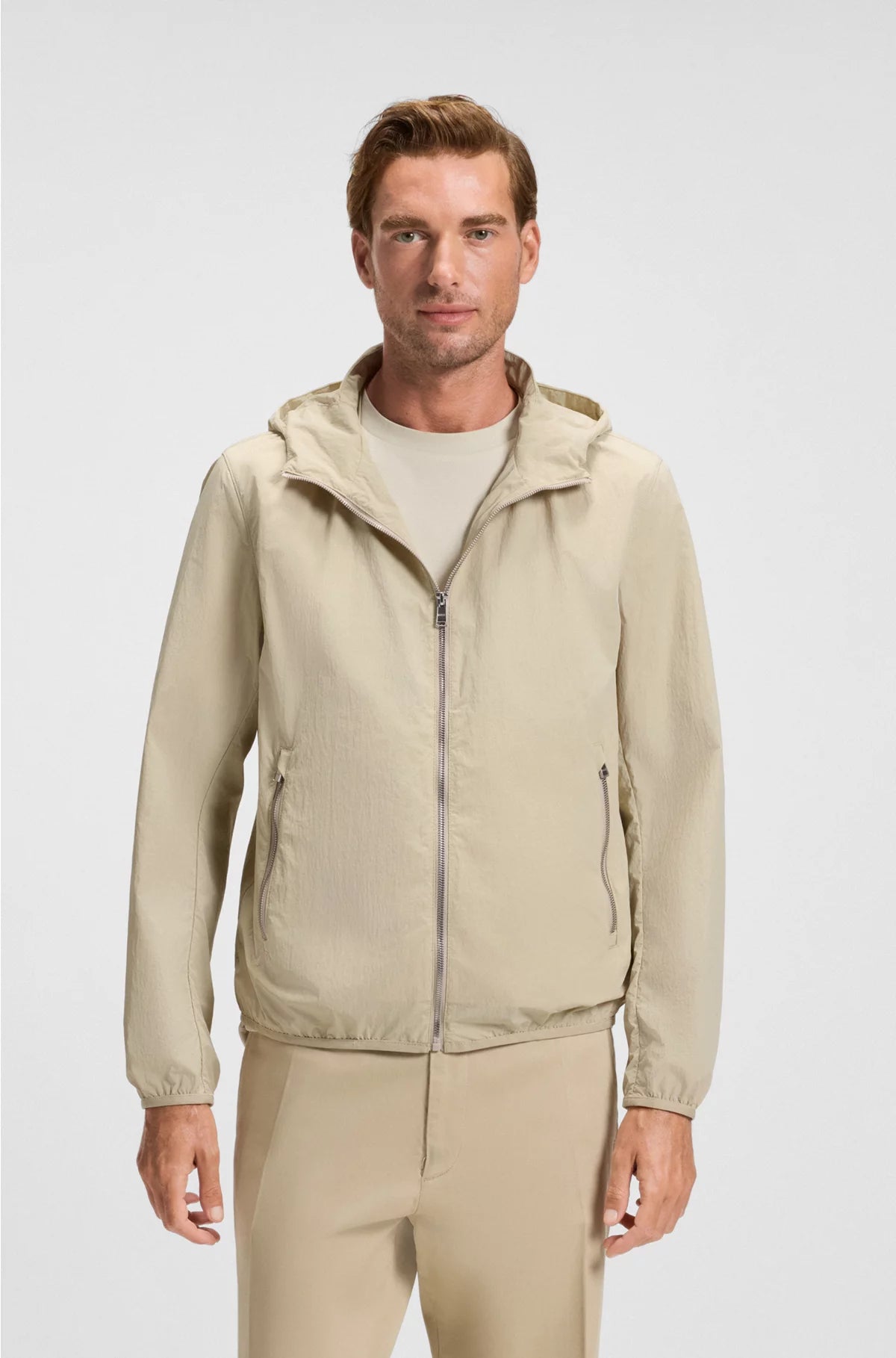 WATER-REPELLENT JACKET IN CRINKLE FABRIC WITH ADJUSTABLE HOOD