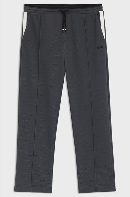 RELAXED-FIT TRACKSUIT BOTTOMS IN QUILTED JACQUARD