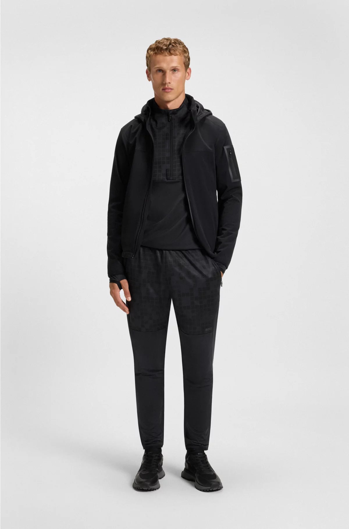 ACTIVE TRACKSUIT BOTTOMS IN GRAPHIC-PRINT PERFORMANCE FABRIC