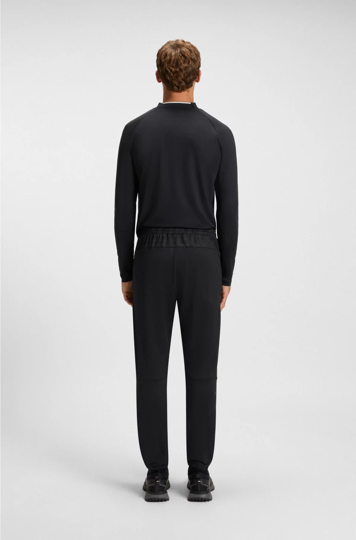 ACTIVE TRACKSUIT BOTTOMS IN GRAPHIC-PRINT PERFORMANCE FABRIC